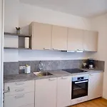 In Apartment *